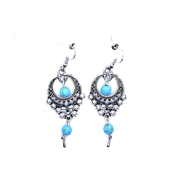 Pendentif argenté et perles turquoises