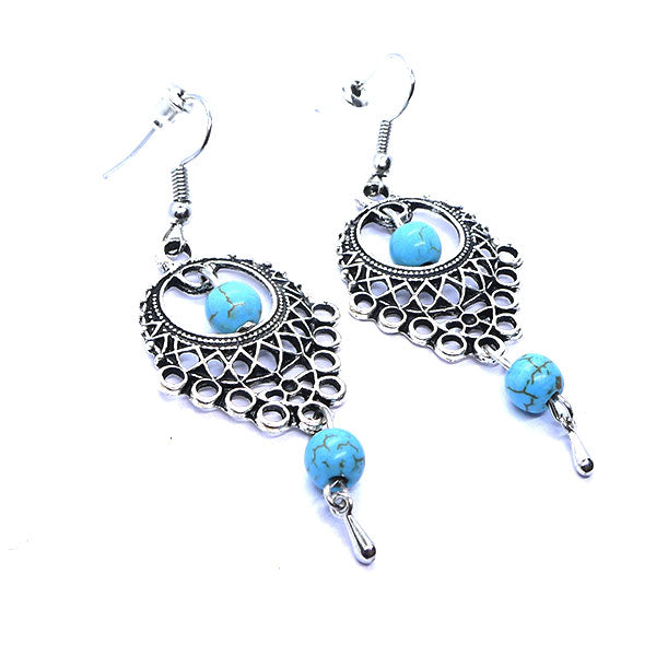 Pendentif argenté et perles turquoises