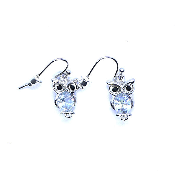 Petit hibou argenté et cabochon brillant